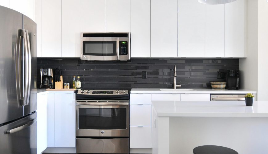 gray steel 3-door refrigerator near modular kitchen